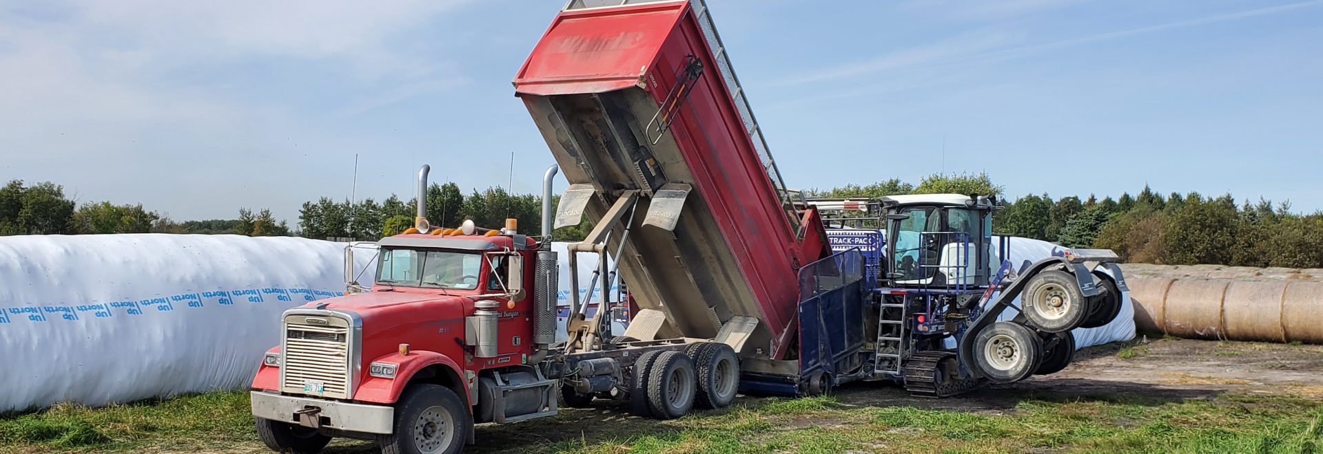 Truck unloading into bagger
